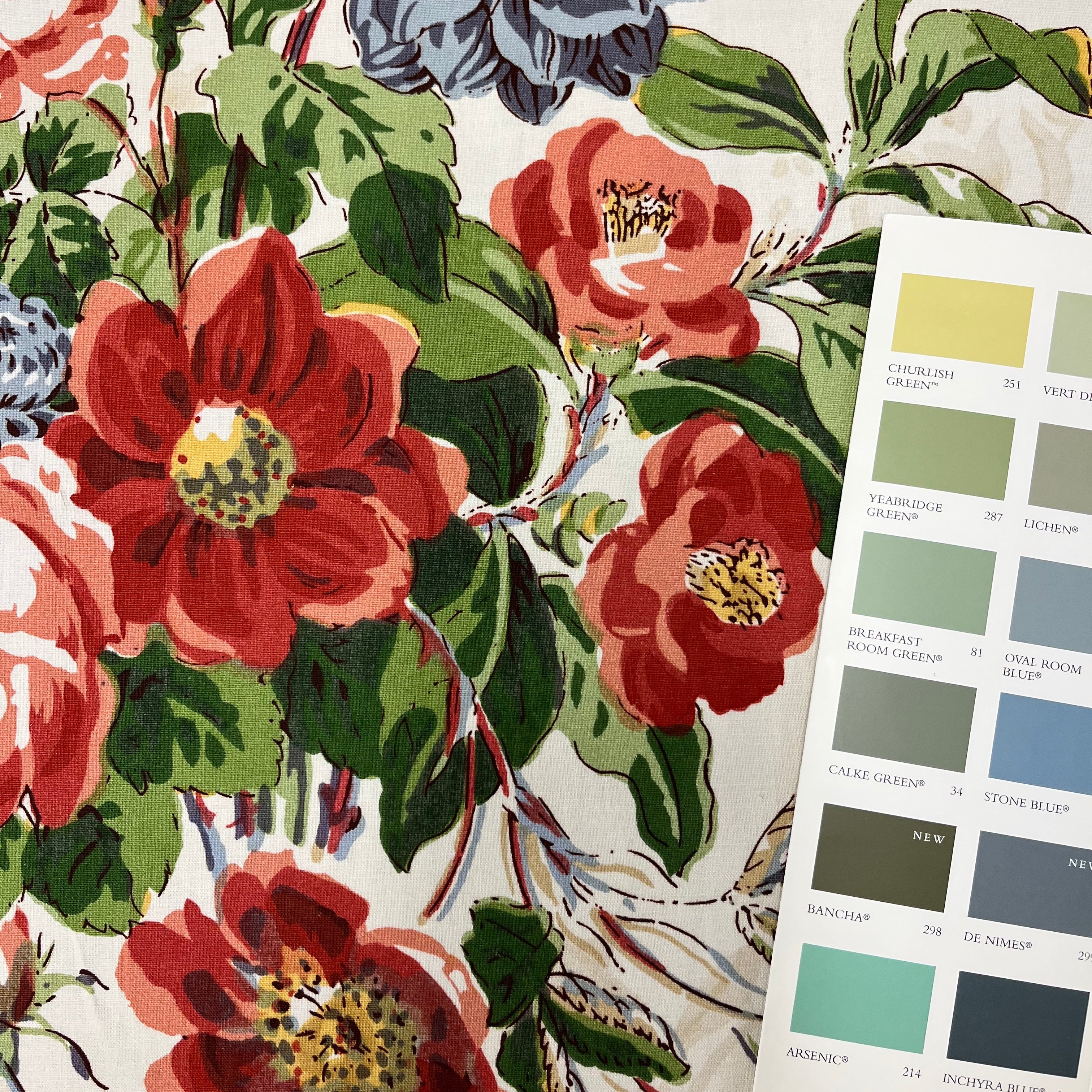 Floral fabric pattern with a color swatch for design reference